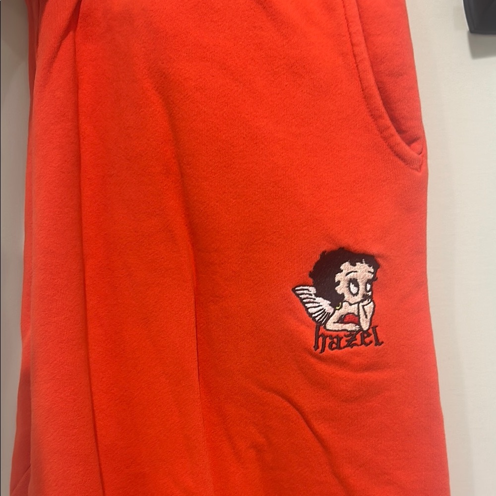 Vibrant Red Sweatpants with Cartoon Detail